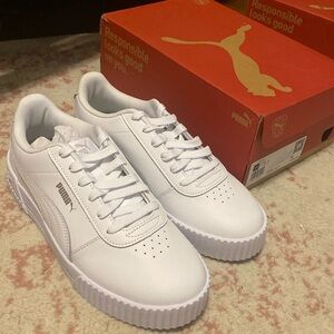 Women’s 9.5 puma carina sneaker white. Brand new with original box